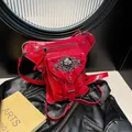 Glossy red punk waist bag with silver skull ornament and metal studs detail - Red