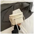 Sacoche selle blanc crème minimaliste avec fermetures éclair argentées et similicuir - Blanc Cassé