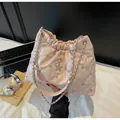 Pink patent leather quilted bucket bag with star diamond and silver chain strap - Pink