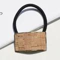 Elastic hair band with a rectangular gold frame and natural cork texture finish - Impression Sunrise