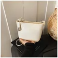 Cream white woven textured mini bucket bag with silver heart charm and slim strap - With Pendant / White
