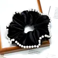 Elegant black velvet hair scrunchie with white pearl trim decoration on the edges - Black