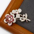 Pink crystal flower brooch in rose gold plating with sparkling rhinestone details - Rose Crystal Flower