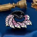 Elegant black resin hair claw clip with gradient pink rhinestones and leaf pattern - Ocean Flower Red