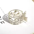 Zilveren legering haarspeld met sterpatroon voor een hoge paardenstaart look - Holle Ster Stijl