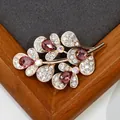 Rose gold flower brooch with purple teardrop crystal and sparkling micro-pave white diamonds - Rose Crystal Leaf