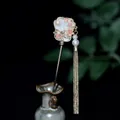 Elegant gold hair pin with pink enamel flower and long metal tassels in vintage style - Pear Style