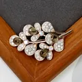 Elegant rose gold leaf brooch with smoky grey crystals and fine micro-pave white rhinestones - Ginger Yellow Crystal Leaf