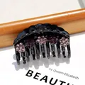 Elegant black acrylic hair claw clip with purple rhinestone floral detail in 80-100 characters - Arc Deep and Light Red