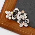 Vintage rose gold butterfly brooch with black teardrop crystals and sparkling rhinestones - Graphite Crystal Butterfly