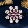 Elegant floral hair claw clip with pink crystals and rhinestones on a velvet background - Cotton Rose Red