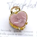 Chic gold-plated acetate claw clip featuring a pink heart marble pattern for hair styling - Heart Shape - Marble Elegant Pink