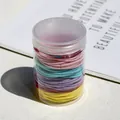 Colorful macaron elastic hair bands set in a clear storage jar for daily hairstyling - Dazzle Color Series