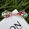 Funkelnde Schmetterling Haarspange mit bunten Strasssteinen auf goldener Legierung - Farbe Nr. 14