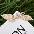 Eleganter roségoldener Flügel Haarclip mit Kunstperlen und einer zentralen Perle - Perle Stil 23
