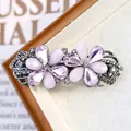 Elegante molletta per capelli a fiori viola con cristalli lucidi e base in lega scura - Margherita Rosa