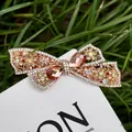 Haarklammer mit Champagner-Kristallschleife auf Roségold-Metall und Strass-Blumendetails - Gelb Stil 26