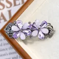 Elegante fermaglio per capelli a fiore in cristallo viola con strass argentati e petali - Margherita Lavanda