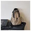 Khaki nylon pleated backpack with adjustable straps and side drawstring pockets - One Size / Khaki
