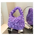 Detailed view of purple satin pleated handbag with ruffles and bubble texture - One Size / Purple