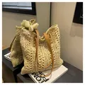Borsa tote in paglia intrecciata beige con spallacci in pelle marrone per l'estate - Taglia unica / Cachi