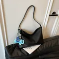 Black large hobo bag with litchi texture and cute blue elephant pendant detail - With Elephant Pendant / Black