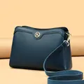 Minimalist navy blue pebble leather shoulder bag with circular golden YG metal logo - One Size / Dark Blue