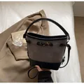 Brown canvas and black leather bucket bag with horn toggle button and top handle - One Size / Black