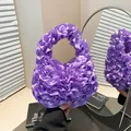 Chic purple ruffled satin handbag with elegant layered pleats and a mini top handle - One Size / Purple