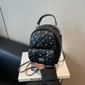 Black quilted mini backpack with rhinestone decor and chain strap variant - One Size / Black