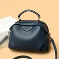 Women's navy blue litchi pattern leather handbag with adjustable crossbody strap - Dark Blue