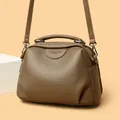 Brown leather handbag with pebble texture and adjustable shoulder strap for women - Elephant Grey