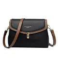 Bolso bandolera chic de cuero negro y marrón para mujer con elegantes hebillas de metal dorado - Negro