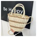 Woven straw bucket bag in beige and light brown stripes with a drawstring lining - White