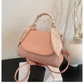 Pink crossbody bag with woven texture, fashion logo and scarf wrapped handle - Pink