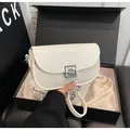 Chic cream leather and woven canvas saddle bag with silver geometric metal clasp in a gift box - One Size / Off White