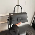 Sac bandoulière noir élégant en cuir lisse et tissu texturé avec poignée - Sans pendentif / Noir