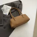 Brown frosted leather bowling handbag with pebble texture and vintage shoulder strap - With Pendant / Khaki