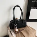 Black litchi grain leather bowling bag with white stitching and baseball charm - With Pendant / Black With Pendant