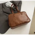 Minimalist vintage brown leather Boston bag with soft texture and slim handles - No Pendant / Brown