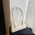 Minimalist cream shoulder bag with MUHETI SHI SHANG embossing on premium leather finish - No Pendant / White