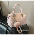 Pale pink glossy Boston bag for women with silver hardware and heart charm detail - With Heart Charm / Light Pink