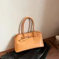 Minimalist orange leather shoulder bag with decorative buckle and dual long handles - No Pendant / Yellow Brown
