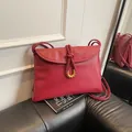 Classic dark red leather shoulder bag with woven strap and golden U-shaped buckle - Large / Red
