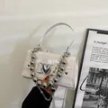 Cream mini square handbag with crocodile pattern and silver heart-shaped metal clasp - Off White