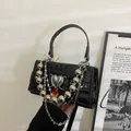 Black crocodile pattern mini handbag with silver heart buckle and metal chain strap - Black