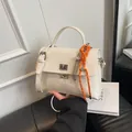 Chic beige soft leather messenger bag with orange woven rope and silver buckle - With Pendant / White