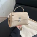 Minimalist beige soft leather flap messenger bag with silver twist lock and strap - No Pendant / Apricot