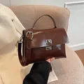 Deep brown oil-wax leather satchel with silver twist lock and adjustable strap - No Pendant / Coffee