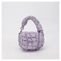 Detailed close-up of light purple quilted cloud bag with padded texture and silver clasp - One Size / Purple